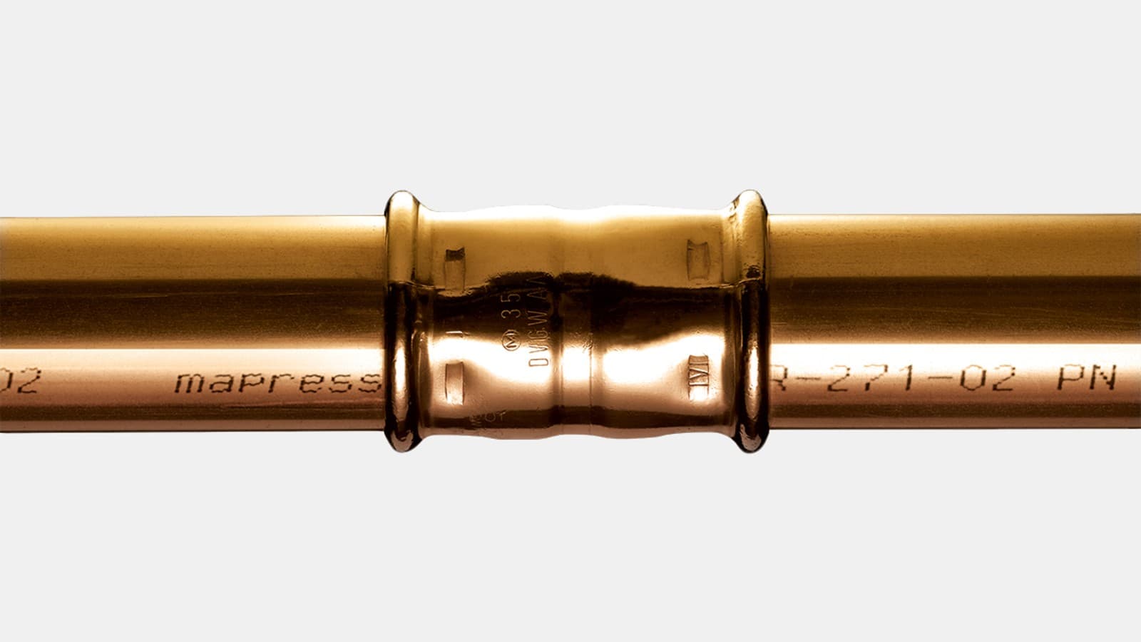 Geberit MapressCuNiFe systemrør presset med en Geberit MapressCuNiFe muffe Geberit MapressCuNiFe systemrør presset med en Geberit MapressCuNiFe muffe