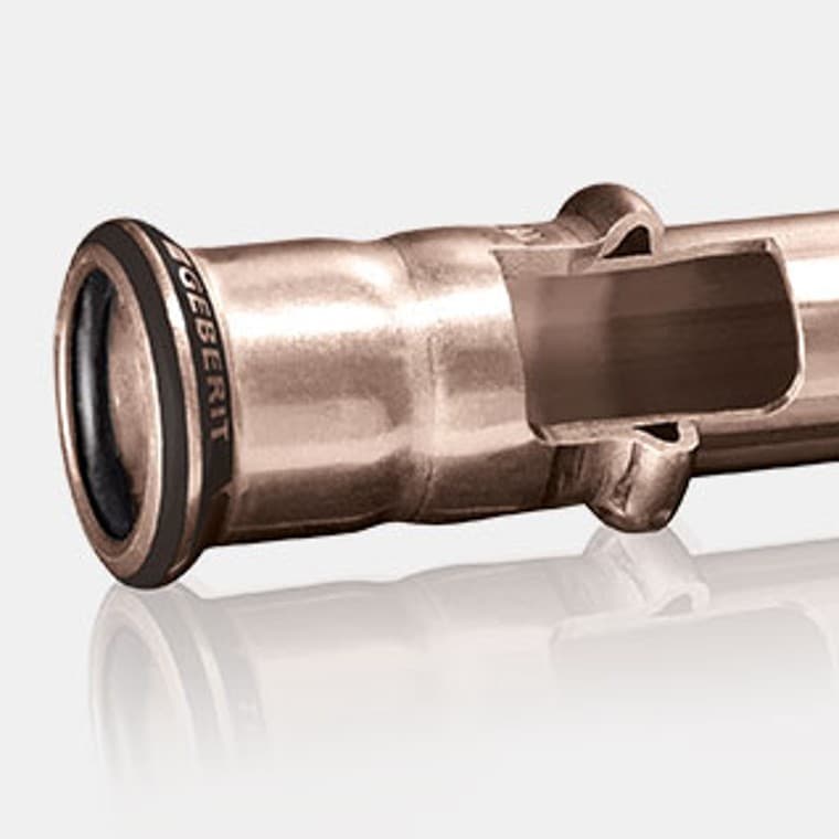 Tværsnit af Geberit Mapress CuNiFe systemrør og muffe Tværsnit af Geberit Mapress CuNiFe systemrør og muffe